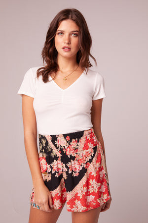 Shake It Up Black Floral Smocked Waist Shorts